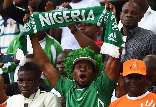 This photo shows Nigerians watching a football match